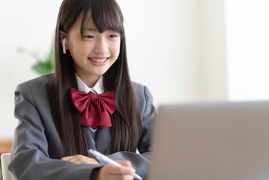 junior high school students studying at home