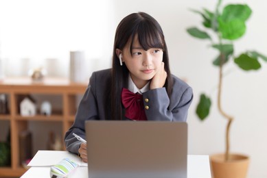 junior high school students studying at home