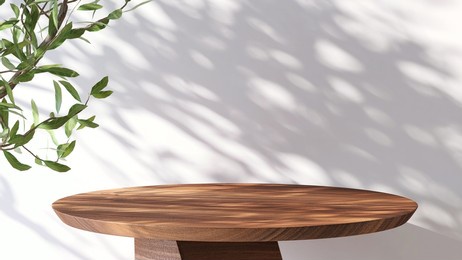 realistic 3d render background for products overlay. close up of a round empty teak wood table with sunlight and leaves shadow on white wall behind. organic beauty, natural concept. mock up, podium.