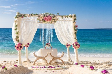 beach wedding set up, tropical outdoor wedding reception, beautiful cabana, wedding arch