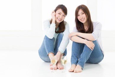 young attractive asian women who drinks wine