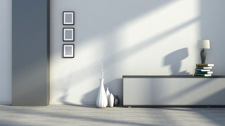 interior with empty pictures, vases and table lamps on the books