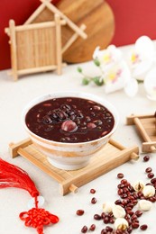laba porridge eight treasure congee, traditional chinese dish served at laba or lantern festival, chinese red concept