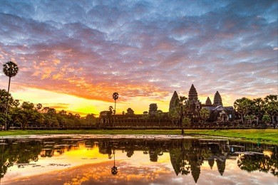 status silhouette of angkor wat in sunrise, the best time in the morning at siem reap, cambodia