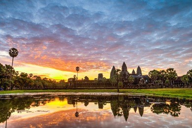 status silhouette of angkor wat in sunrise, the best time in the morning at siem reap, cambodia