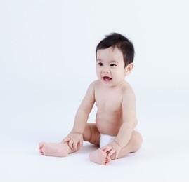 thai baby looking isolated 