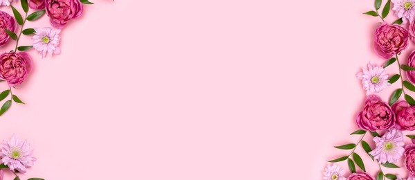 banner with frame made of rose flowers and green leaves on a pink background. springtime composition with copyspace.