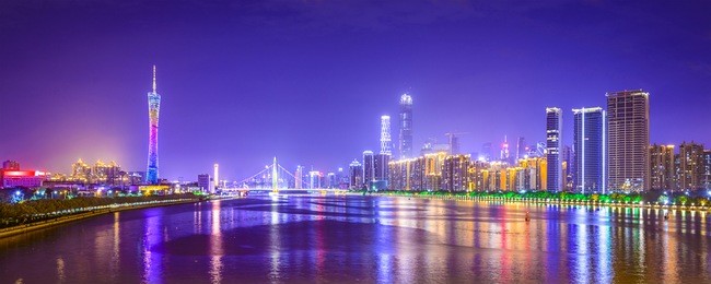 guangzhou, china city skyline panorama over the pearl river.