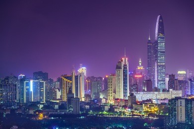 shenzhen, china city skyline at twilight.