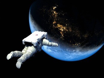 the astronaut on a background of a planet  "elemen ts of this image furnished by nasa"