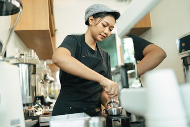 engineer, foreman hard work with machine at factory	