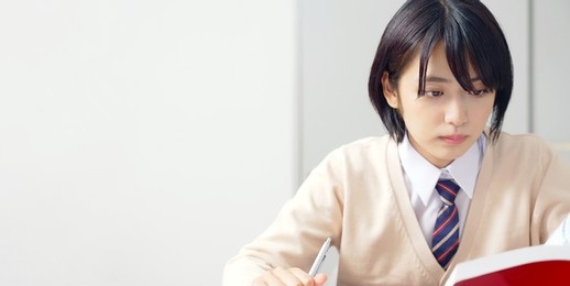 asian female high school in classroom. cram school. preparatory school.