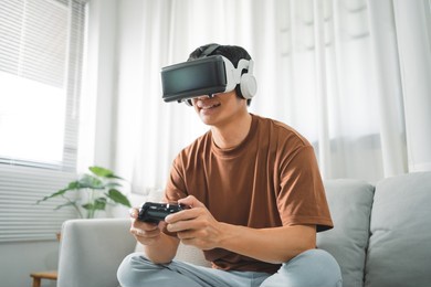 asian man using vr headset in glasses of virtual reality technology vr experience future technology concept.