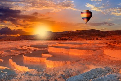 beautiful sunrise and natural travertine pools and terraces, pamukkale, turkey 