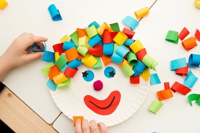 paper plate clown. diy games at home, activities for pre-school kids. 5 minute crafts. children joy and funny to cut a hair for clown.  red nose day theme.