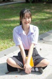 asia thai high school student uniform beautiful girl smile and relax