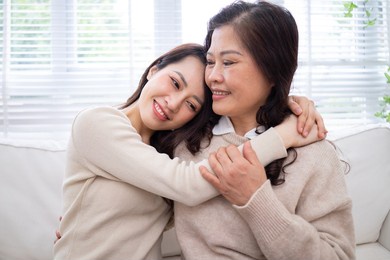 image of asian mother and daughter at home