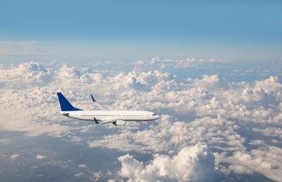 passenger airplane in the clouds. travel by air transport