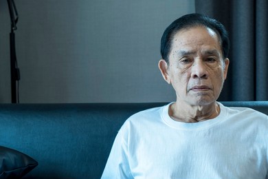 senior asian thoughtful upset elderly man feeling lonely and depressed, looking to aside, lost in thoughts, mature widower thinking about past, nostalgia and melancholy, mental disorder, dementia.