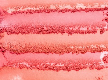 blusher or pressed powder pink orange peach textured background