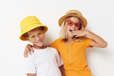 funny kids boy and girl hugging fashion childhood