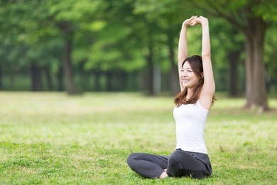 beautiful young asian woman exercising in the park