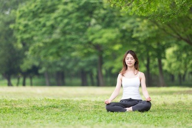 beautiful young asian woman exercising in the park