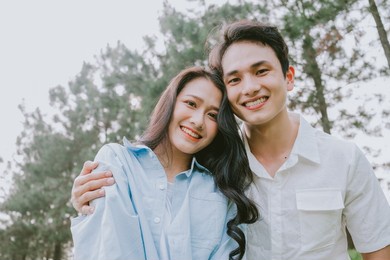portrait of young asian couple outside