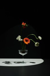 beautiful flowers in coupe glass
