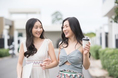 portrait beauty asian two friend woman working together outdoor.