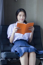 asia thai high school student uniform beautiful girl read a book