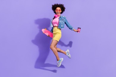full length body size view of attractive fit trendy girl jumping having fun action isolated on bright violet purple color background