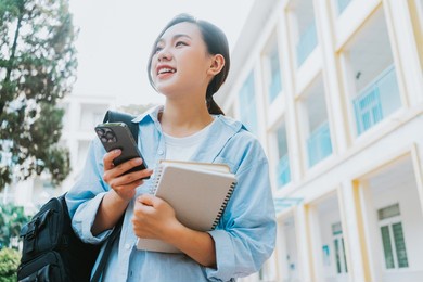 image of young asian college girl at school