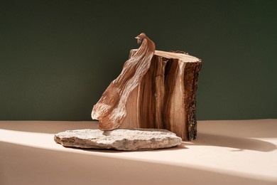 composition empty podium material tree stone dry flowers. product presentation. background beige green. beautiful background from natural materials