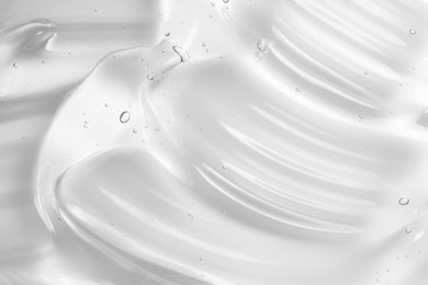 gel serum texture. clear liquid skincare cream background. cosmetic gel with bubbles macro