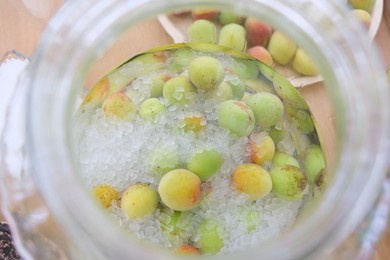making homemade traditional japanese green plum wine or plum syrup or umeshu glass jar unripe and ripe ume fruit and rock sugar process plum vinegar 