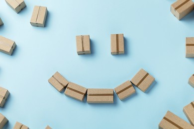 face with a smile from boxes for parcel delivery.