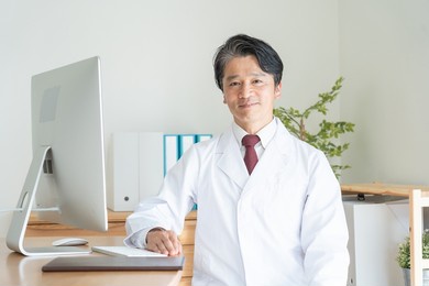 gentle male doctor in his 50s