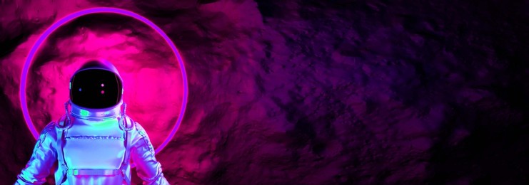 astronaut with colorful visor and white spacesuit with pink and blue moody 80s lighting front, neon cyberpunk, futuristic background. 3d rendering.
