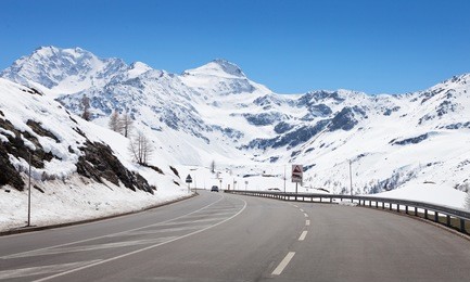 mountain road in a sunny day (swiss alps).  simplon pass, valais, switzerland