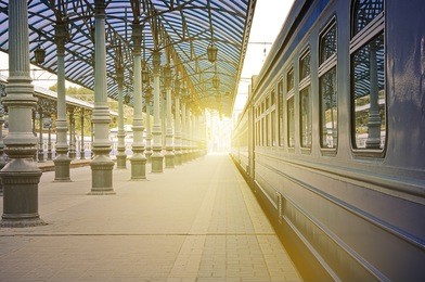 trains stand at the station at sunrise time.