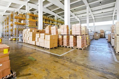 interior of big warehouse with lot of boxes 