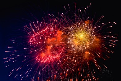 holiday fireworks backgrounds with sparks, colored stars and bright nebula on black night sky universe, comets. amazing beauty colorful fireworks display on celebration, showing. holidays backgrounds