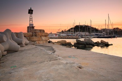 light on a pier in mikrolimano marina, piraeus, athens.