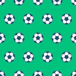 seamless pattern of the football / soccer balls on green field