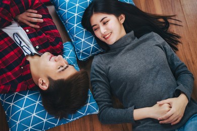asian young couple reading a book together, people lifestyle concept.