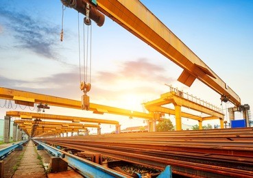 pier bridge crane and cargo handling, cargo trains transported away.