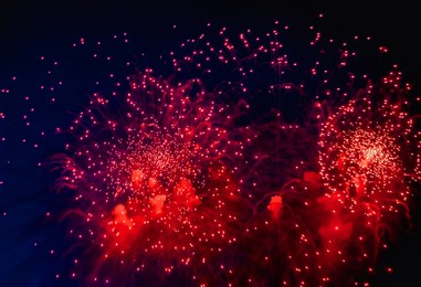 holiday fireworks backgrounds with sparks, colored stars and bright nebula on black night sky universe, comets. amazing beauty colorful fireworks display on celebration, showing. holidays backgrounds