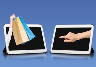 female hands sticking on tablet screen and making online shopping.