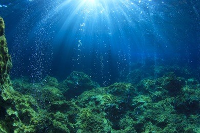 underwater ocean scene with air bubbles, unfocused